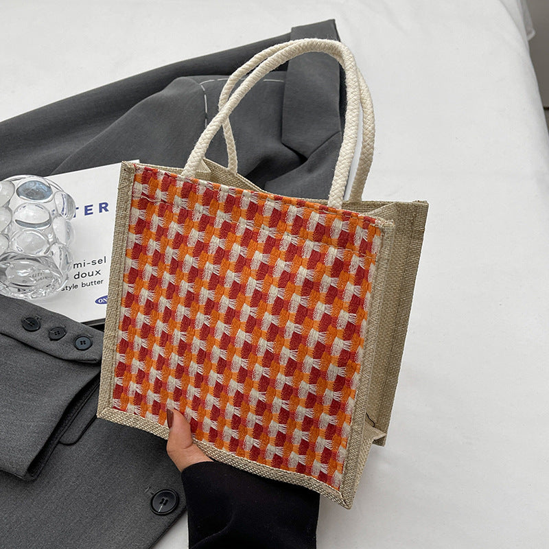 Damen Tragetasche mit geflochtenem Design und dekorativen Griffen Nord Taschen