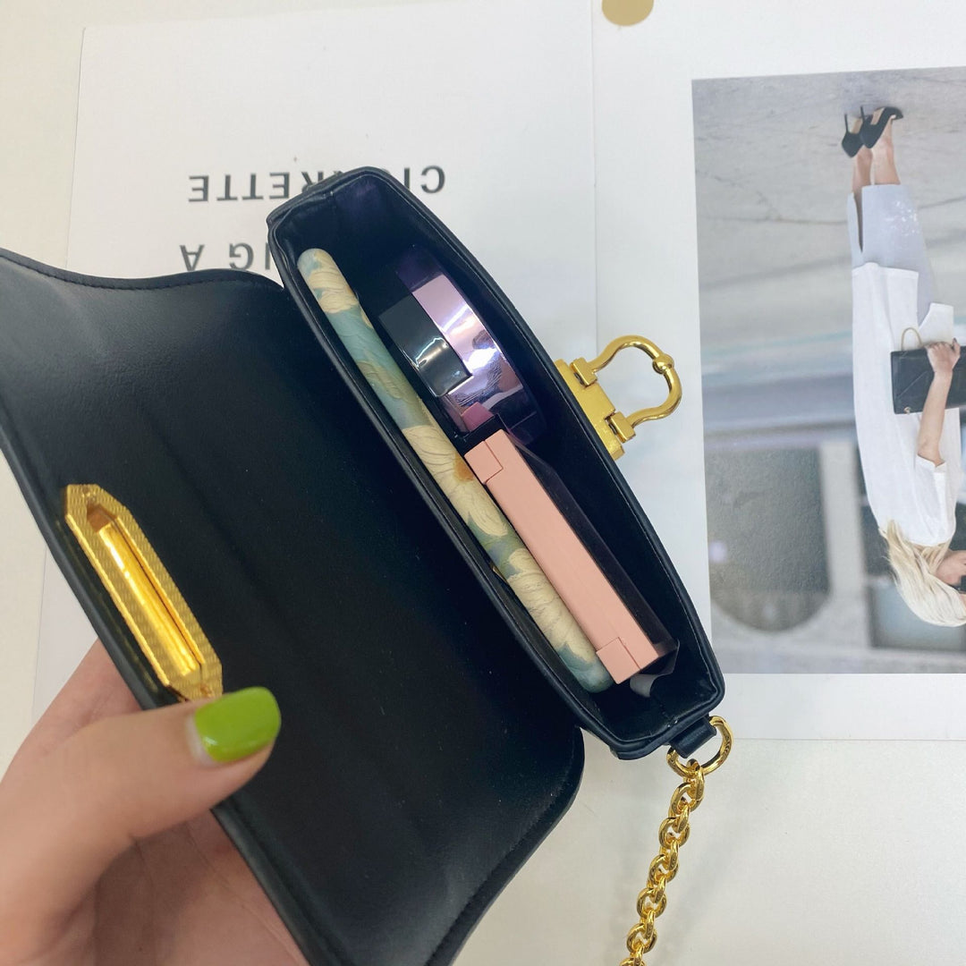Damen Umhängetasche mit elegantem Kettenriemen und klappbarem Verschluss Nord Taschen
