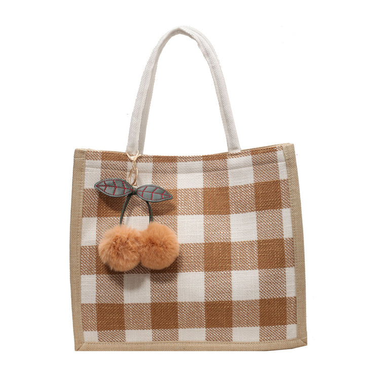 Damen Jute Tragetasche mit stilvollem Karomuster und verspieltem Pompon Nord Taschen