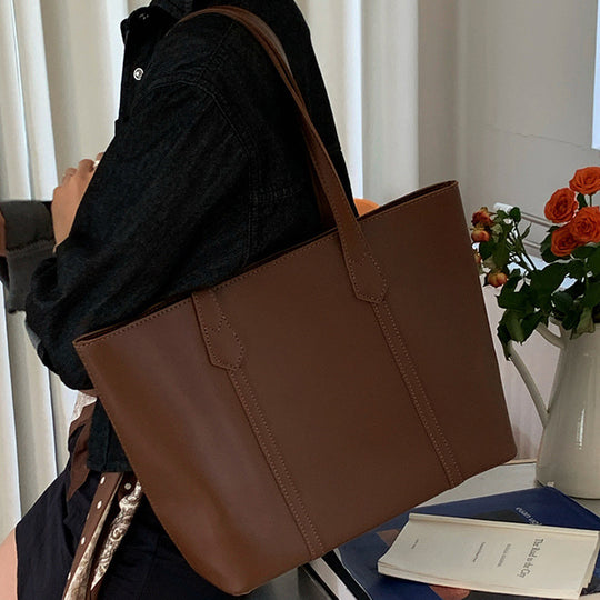 Damen eleganter Shopper mit strukturierten Details und geräumigem Innenraum Nord Taschen