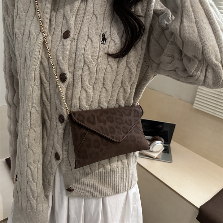Damen elegante Clutch mit Kettenakzent Nord Taschen