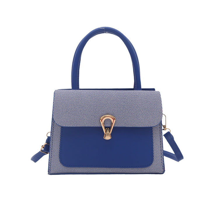 Damen elegante Umhängetasche mit strukturiertem Obermaterial und goldfarbener Verschlussmechanik Nord Taschen