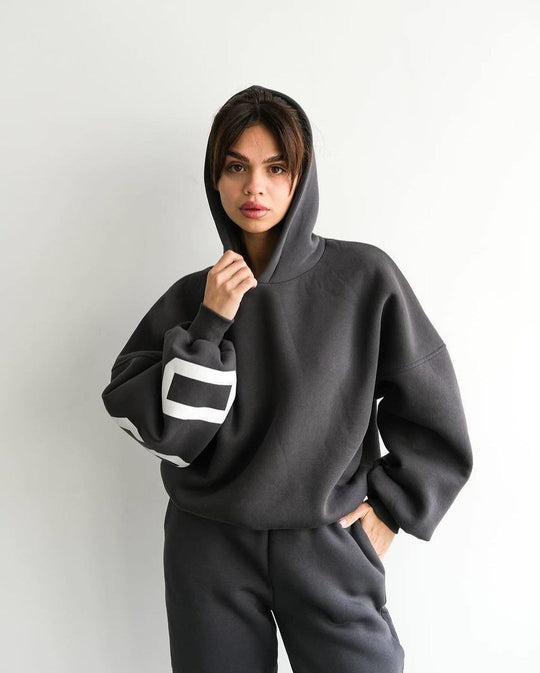 Damen Oversized Kapuzenpullover mit großflächigem Blockprint Nord Taschen