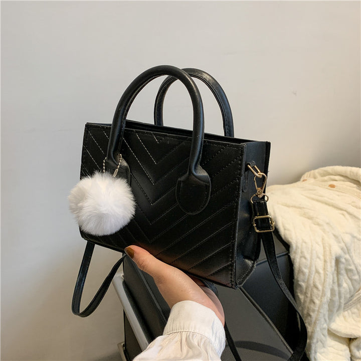 Damen elegante Handtasche im strukturierten Chevron-Design Nord Taschen