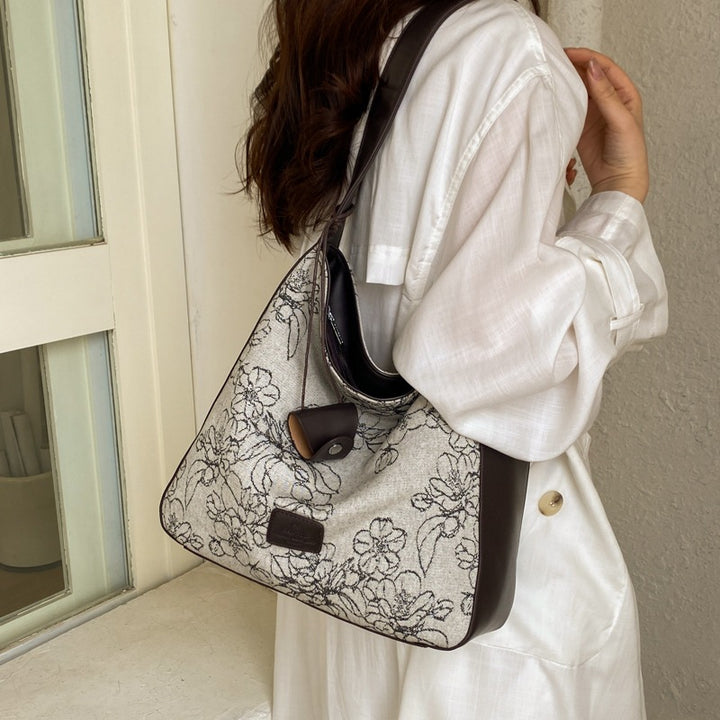 Damen Beuteltasche mit floralem Motiv und weichem Tragegriff Nord Taschen