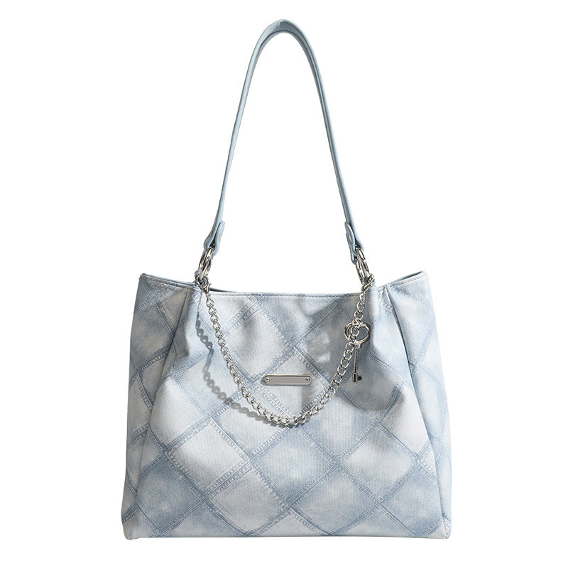 Damen Tragetasche mit schickem Zebramuster und eleganten Kettenakzenten Nord Taschen