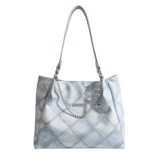 Damen Tragetasche mit schickem Zebramuster und eleganten Kettenakzenten Nord Taschen