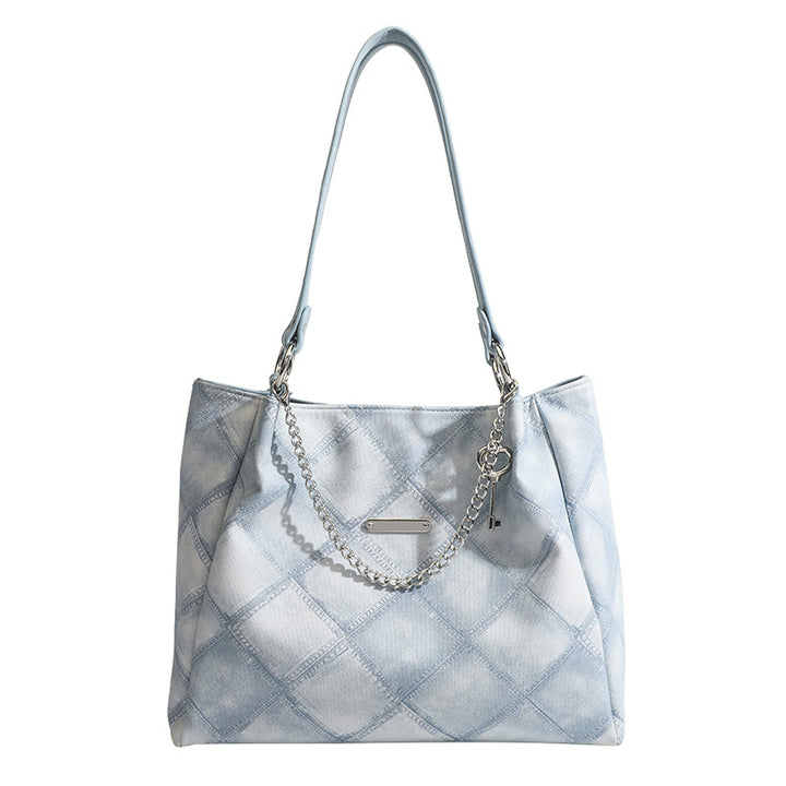 Damen Tragetasche mit schickem Zebramuster und eleganten Kettenakzenten Nord Taschen