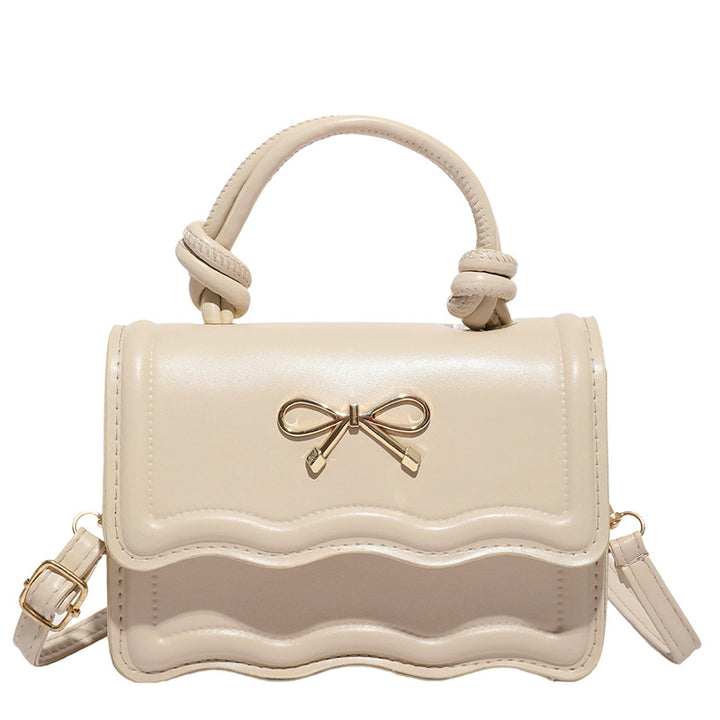 Damen elegante Handtasche mit Wellenstruktur und Schleifendetail Nord Taschen