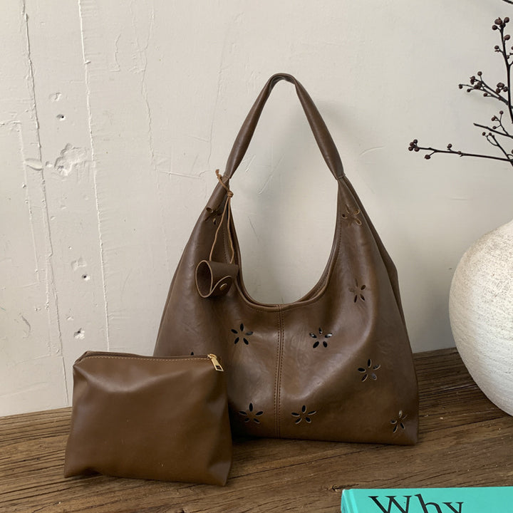 Damen Hobo-Tasche mit floralem Schnitt und praktischem Mini-Organizer Nord Taschen