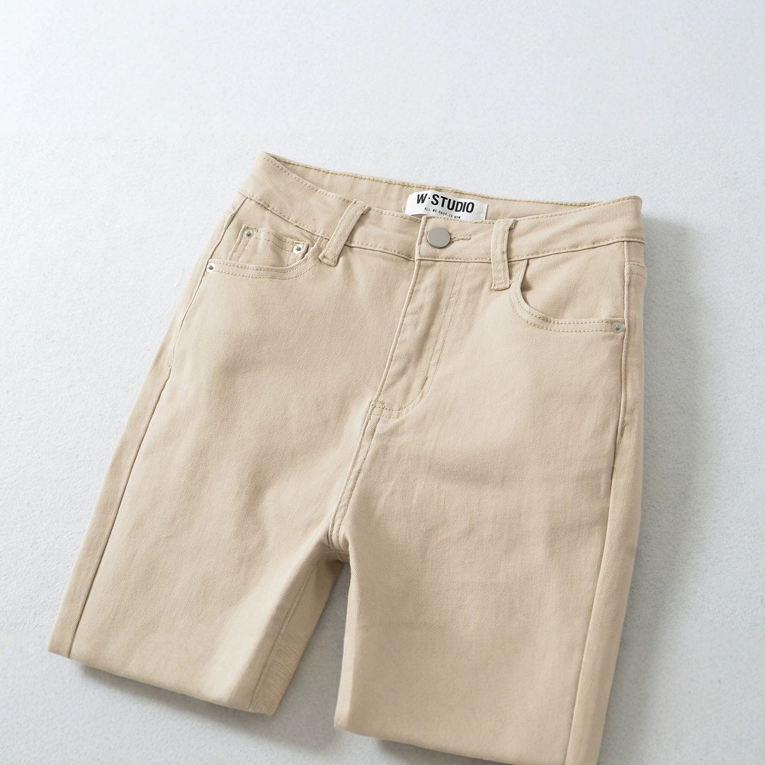 Damen Highwaist-Schlaghose aus Stretch-Denim mit fünf Taschen und rohem Saum Nord Taschen