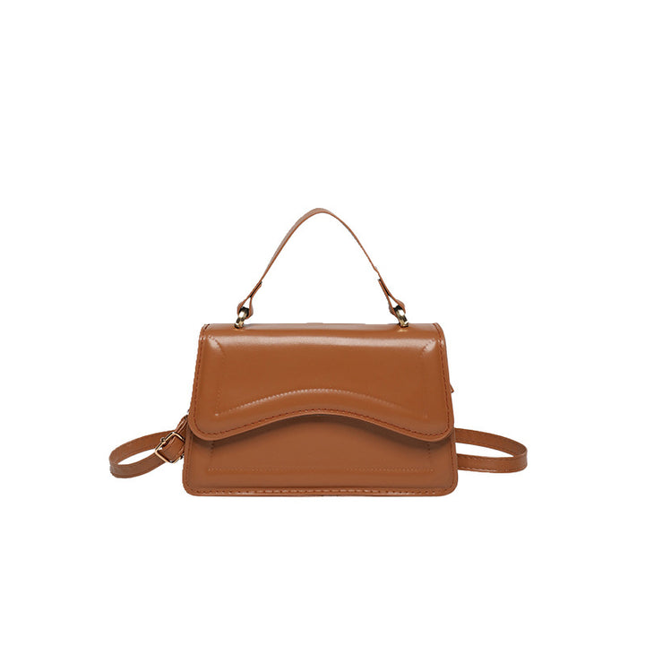 Damen elegante Handtasche mit geschwungenem Design Nord Taschen