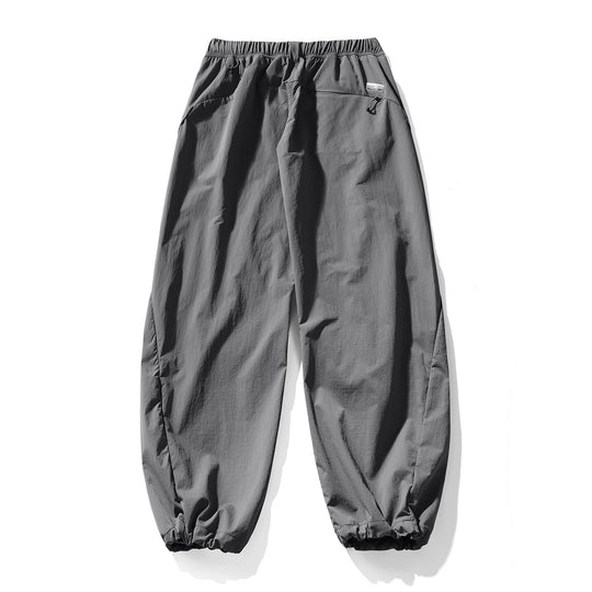 Herren Baggy-Cargohose mit asymmetrischen Eingriffstaschen, Tunnelzugbund und elastischen Knöchelabschlüssen Nord Taschen