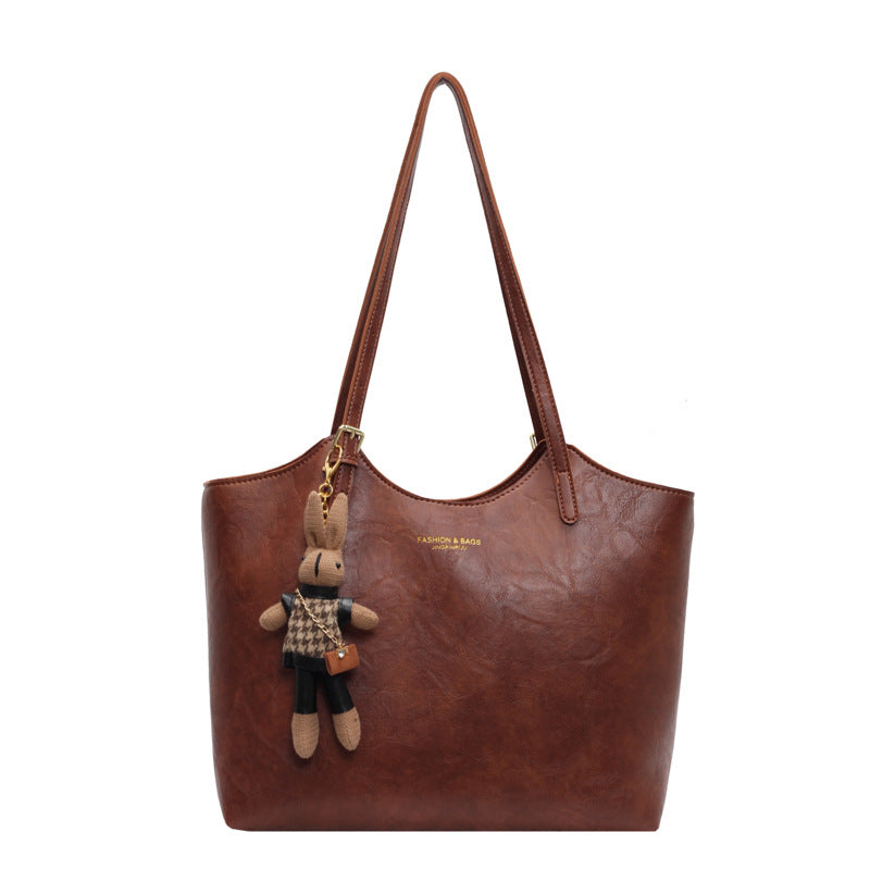 Damen große Handtasche mit verspieltem Stoffanhänger Nord Taschen