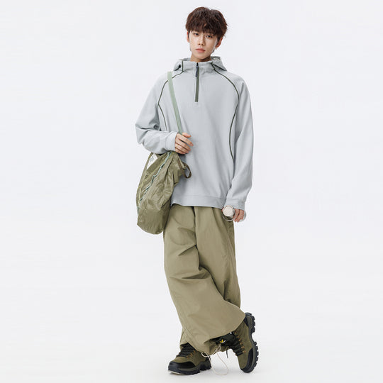 Unisex Oversize Waffelstruktur-Halbzip-Hoodie mit Raglanärmeln und Kontrastpaspeln Nord Taschen
