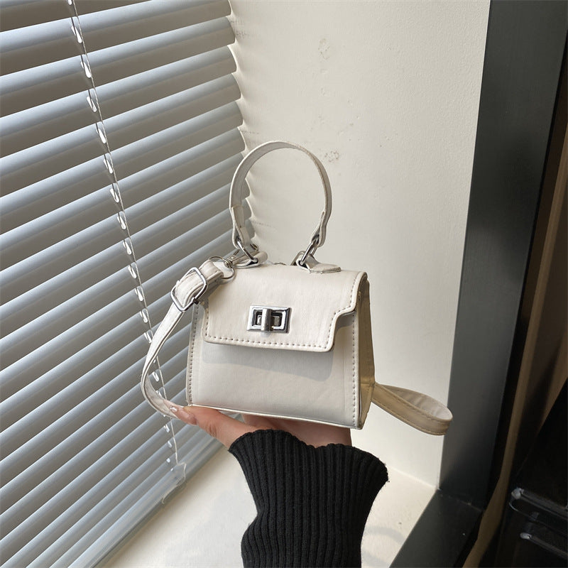 Damen Mini-Handtasche mit luxuriösem Lederlook und praktischen Tragegriffen Nord Taschen