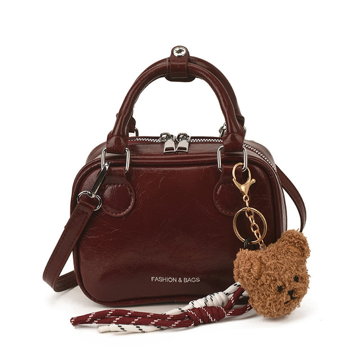 Damen Mini-Handtasche mit niedlichem Anhänger Nord Taschen