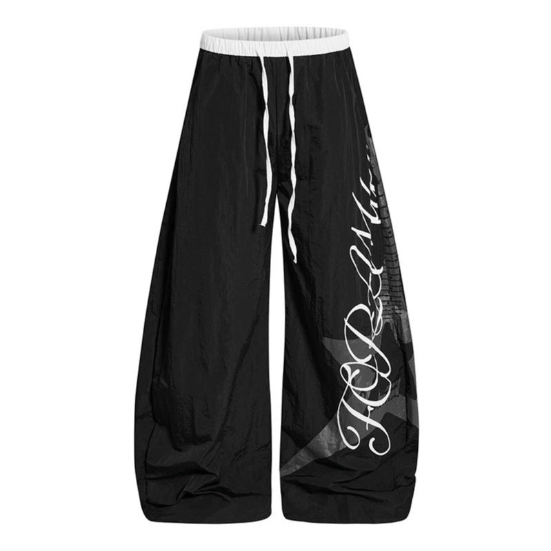 Damen Weite Palazzo-Hose mit Tunnelzugbund und großflächigem Statement-Print Nord Taschen