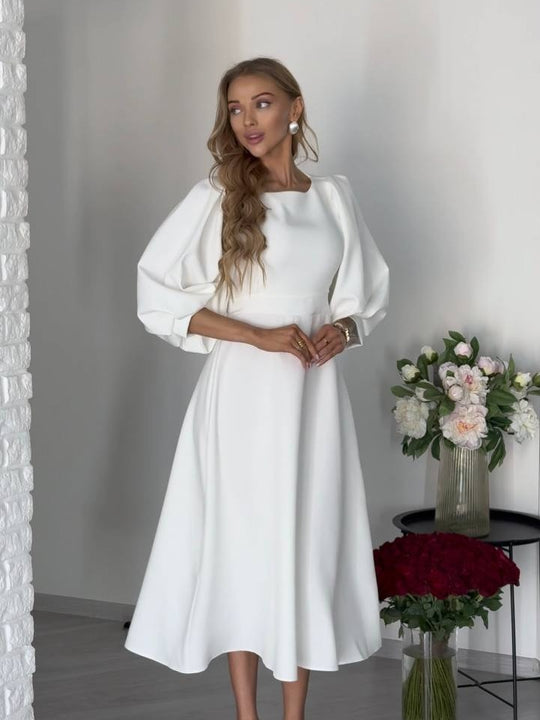 Damen Midikleid mit offenem Rückenausschnitt, voluminösen Puffärmeln und Bindegürtel Nord Taschen