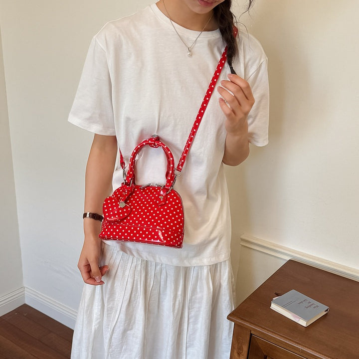 Damen Mini-Handtasche mit verspieltem Punktemuster und abnehmbarem Tragegurt Nord Taschen