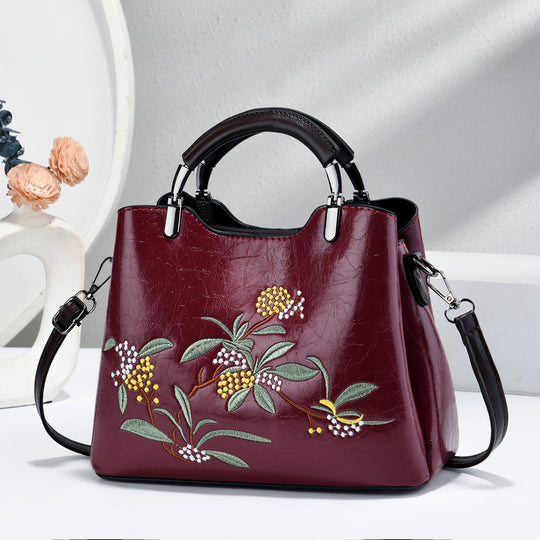 Damen Handtasche mit floraler Stickerei und abnehmbaren Schulterriemen Nord Taschen