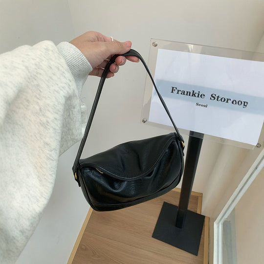 Damen elegante Umhängetasche mit geschwungenem Design und hochwertiger Oberflächenstruktur Nord Taschen