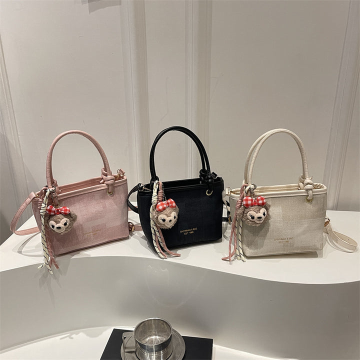 Damen Mini-Handtasche mit abnehmbarem Plüschtier-Anhänger Nord Taschen