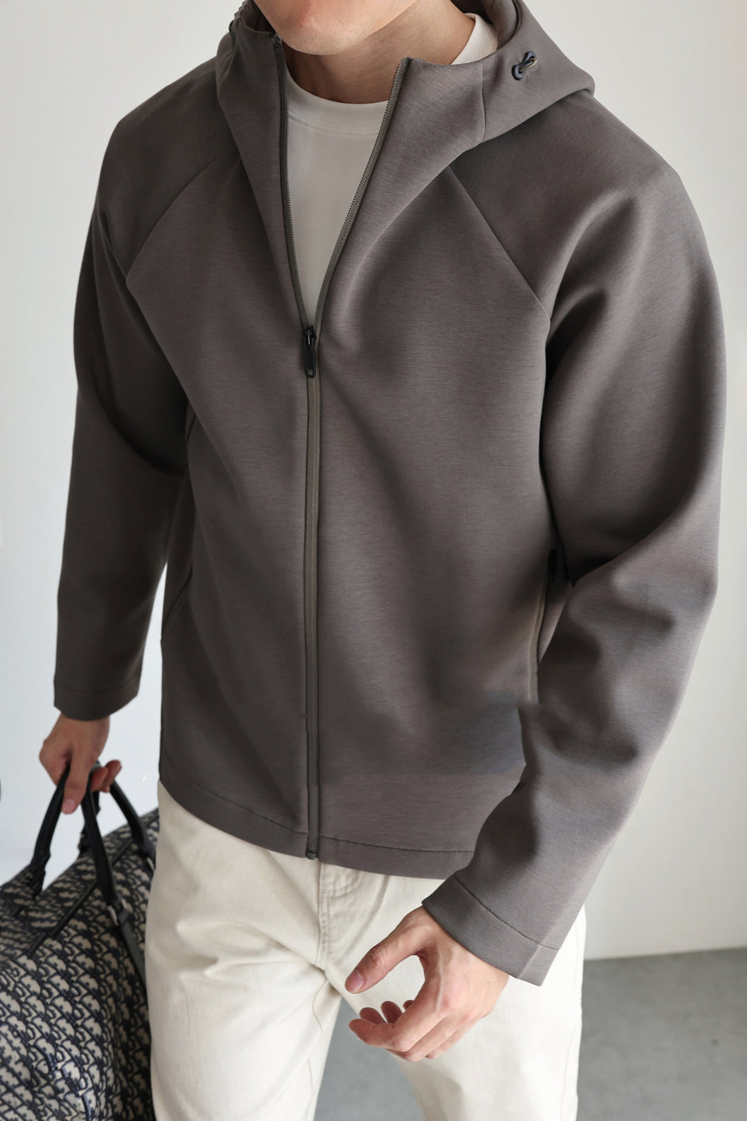 Herren Leichte Kapuzenjacke aus technischem Jersey mit verdecktem Reißverschluss Nord Taschen