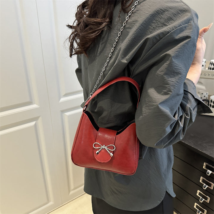 Damen-Handtasche mit verspieltem Schleifendetail und hochwertiger Kettenverzierung Nord Taschen