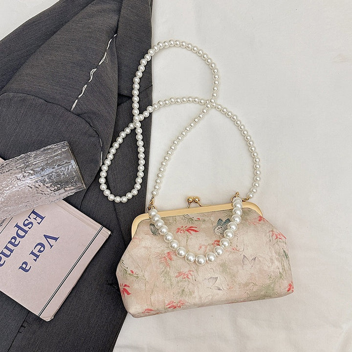 Damen elegante Handtasche mit zartem Blumendruck und Perlenkette Nord Taschen
