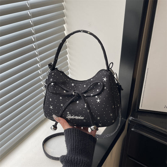 Damen trendige Handtasche mit Sternenmuster und praktischem Kordelzug Nord Taschen
