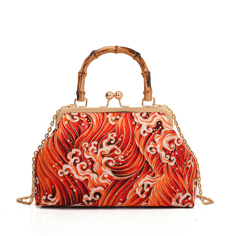 Damen Designer Handtasche mit kunstvollem Wellenmotiv Nord Taschen