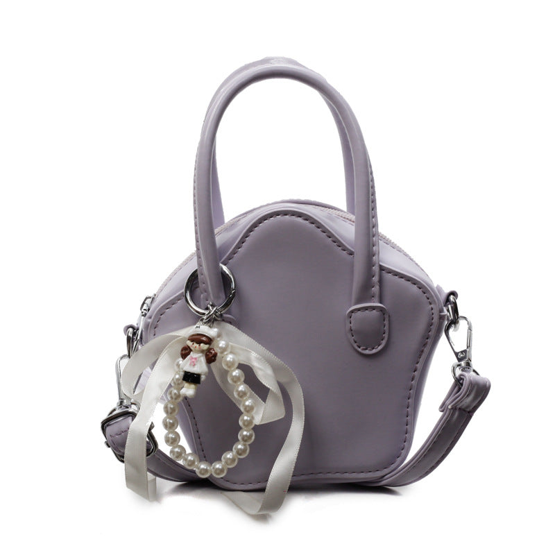 Damen modische Handtasche mit verspieltem Anhänger Nord Taschen
