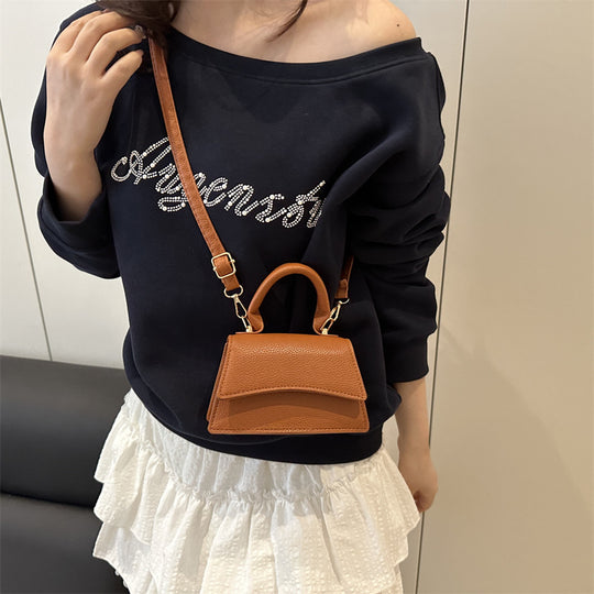 Damen Mini-Handtasche mit verstellbarem Riemen und elegantem Design Nord Taschen
