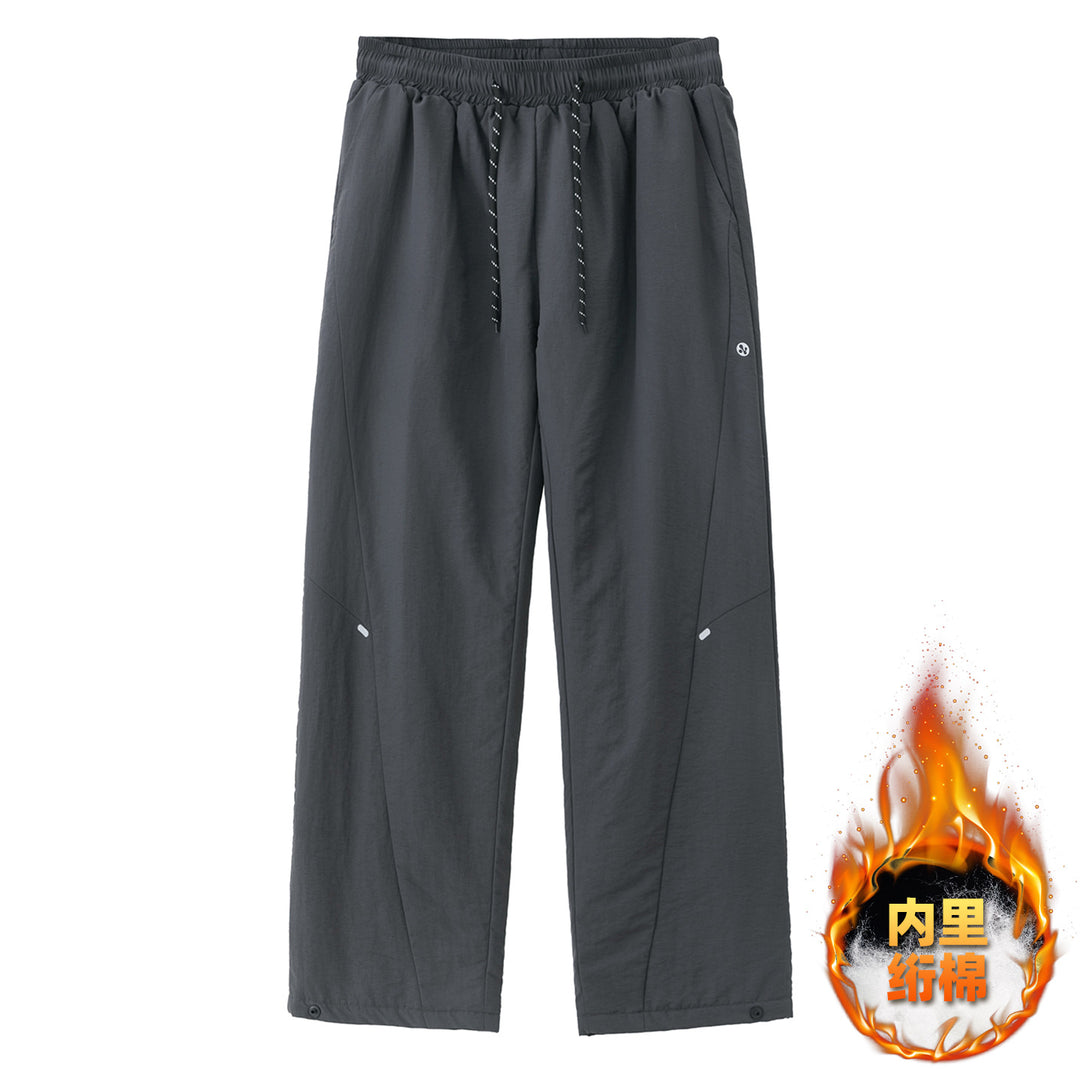 Unisex Weite wasserabweisende Nylon-Freizeithose mit elastischem Bund und Druckknopf-Saum Nord Taschen
