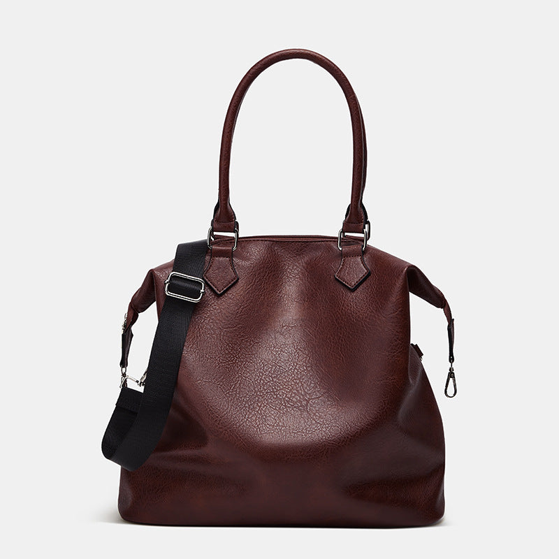 Damen Handtasche mit verstellbarem Schulterriemen und eleganter Lederstruktur Nord Taschen