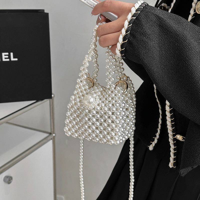 Damen Clutch-Tasche mit perlensynthetischer Oberfläche und dekorativem Verschluss Nord Taschen