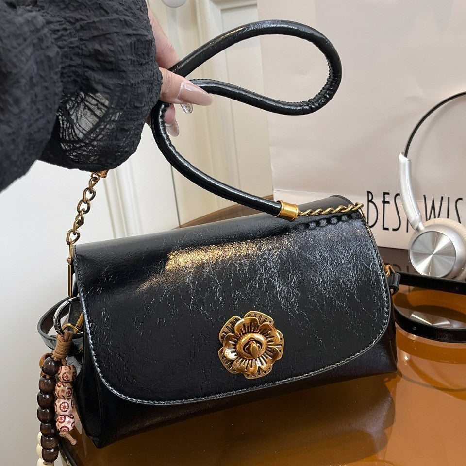 Damen elegante Umhängetasche mit floralem Verschluss Nord Taschen
