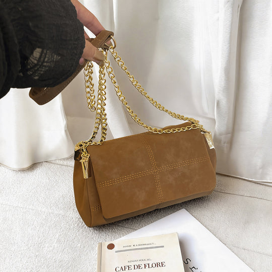 Damen elegante Umhängetasche aus hochwertigem Wildleder mit goldenen Kettenakzenten Nord Taschen