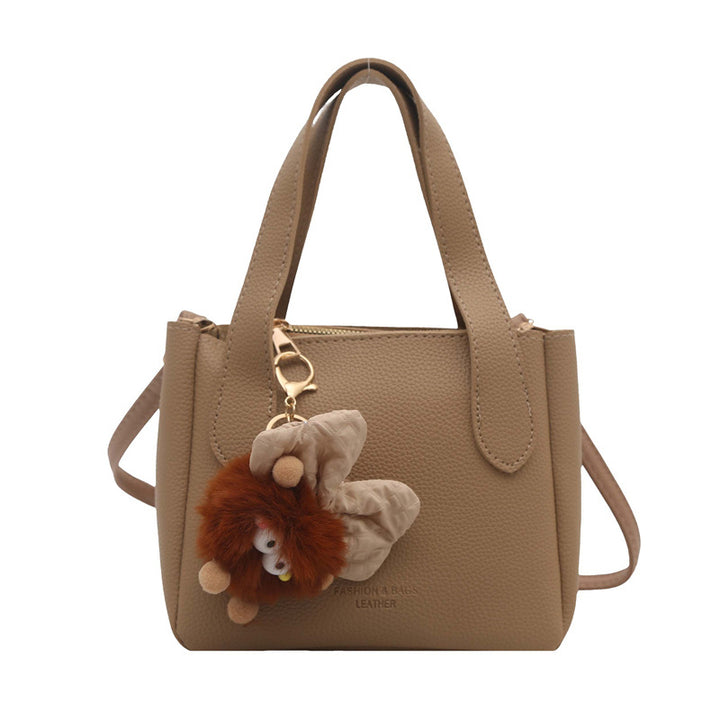 Damen elegante Handtasche mit flauschigem Anhänger Nord Taschen