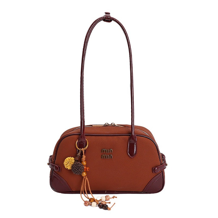 Damen elegante Handtasche mit verspielten Anhängern Nord Taschen