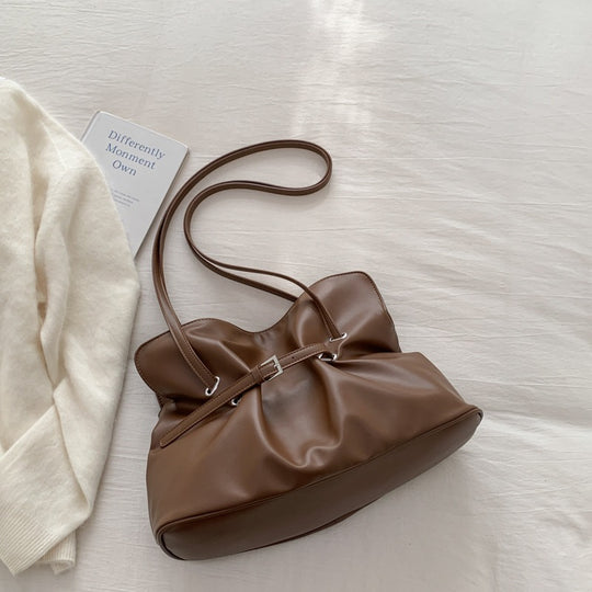 Damen Umhängetasche aus hochwertigem Kunstleder mit verstellbarem Kordelzug Nord Taschen