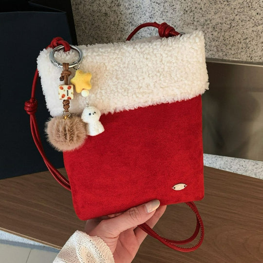 Damen Umhängetasche aus weichem Wildleder mit verspieltem Plüschkragen Nord Taschen