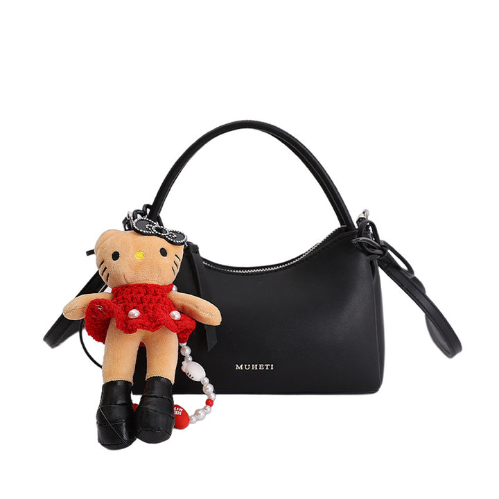 Damenhandtasche im charmanten Retro-Stil mit verspieltem Anhänger Nord Taschen