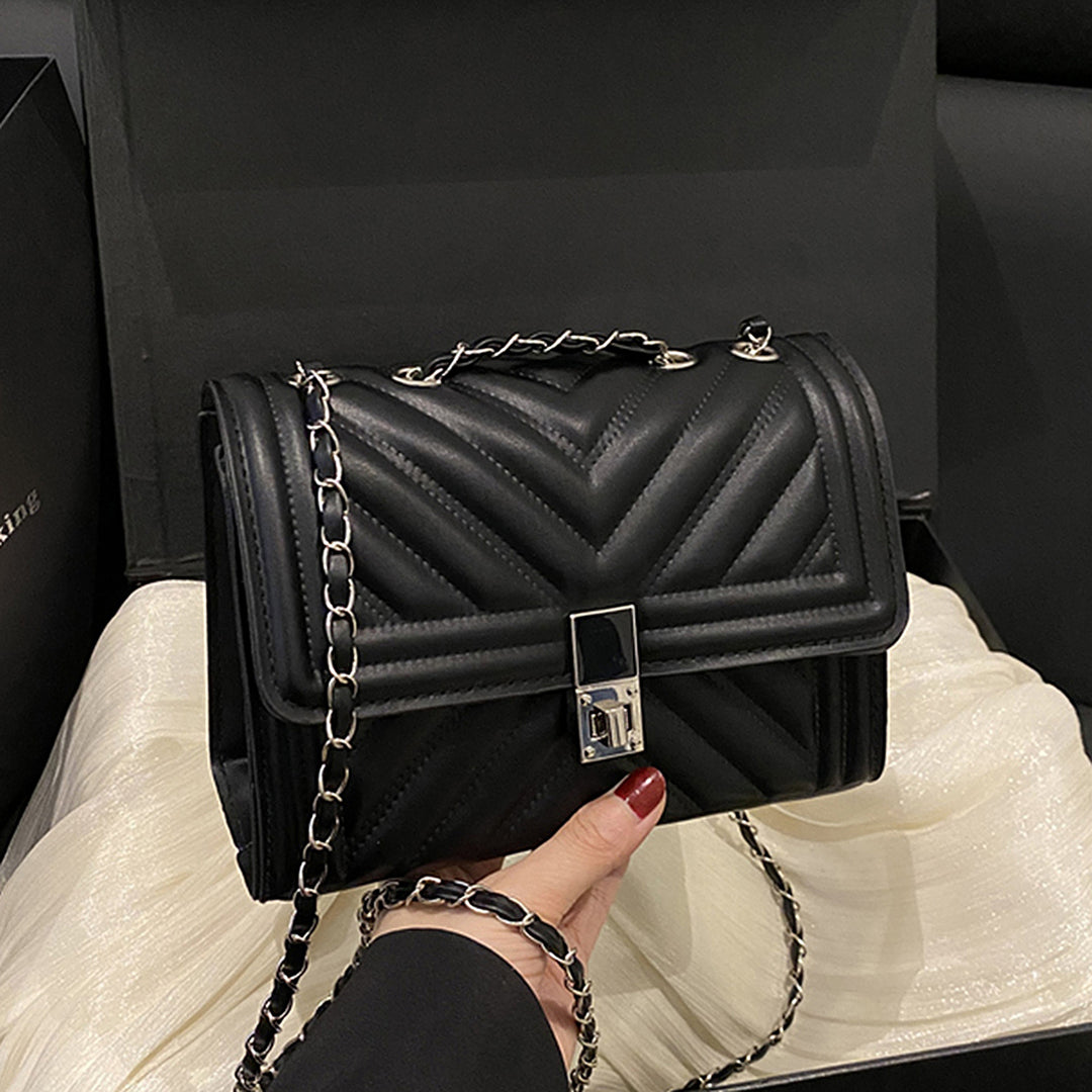 Damen Handtasche mit innovativem Ketten-Riemen Nord Taschen