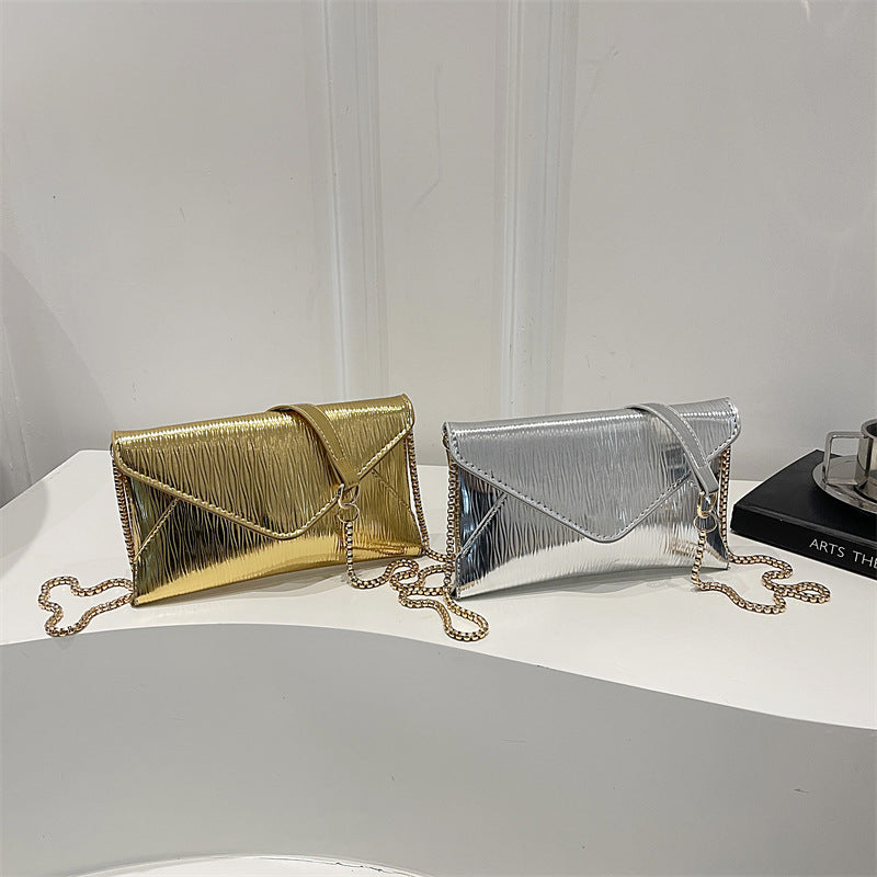 Damen elegante Clutch mit schimmerndem Wellenmuster Nord Taschen