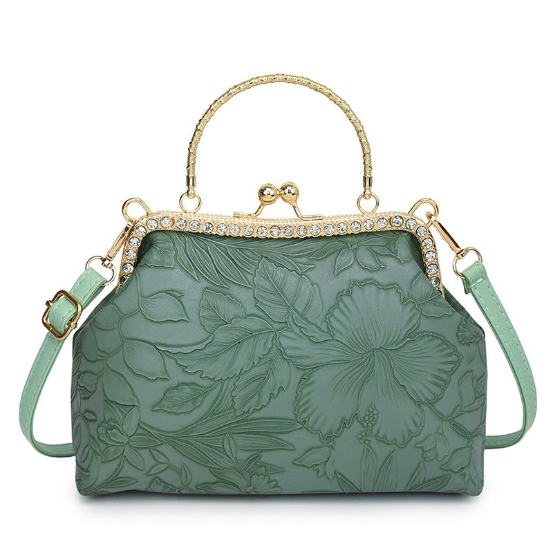 Damen elegante Handtasche mit floralem Relief und goldenen Akzenten Nord Taschen