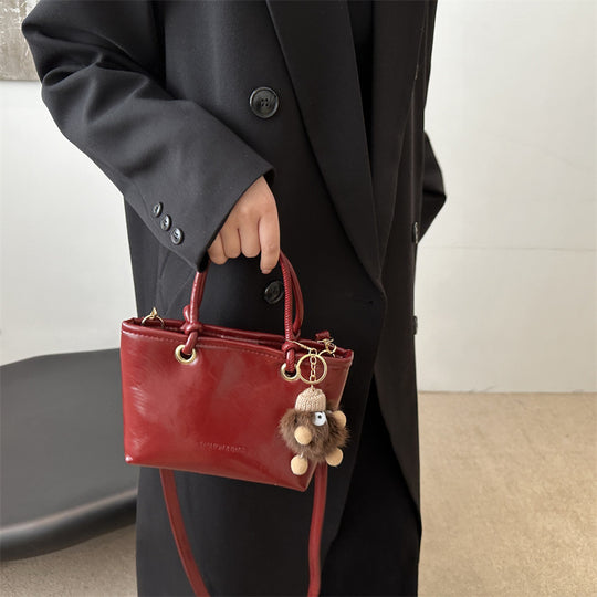 Damen modische Handtasche mit charmantem Anhänger und hochwertiger Verarbeitung Nord Taschen