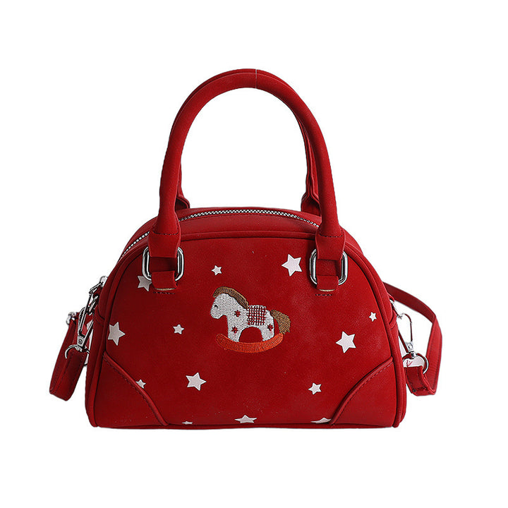 Damenhandtasche mit tierischem Motiv und dekorativen Sternen Nord Taschen