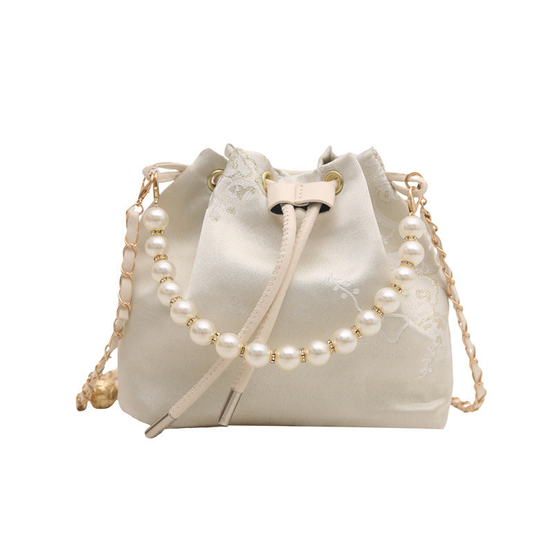 Damen modische Beuteltasche mit floralem Design und Perlenakzenten Nord Taschen